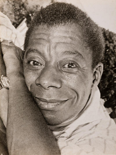 JOHN PAIGNTON (JOHN S. BARRINGTON, 1920-1991) A group of 5 photographs of James Baldwin, author and advocate for the Civil Rights Movem