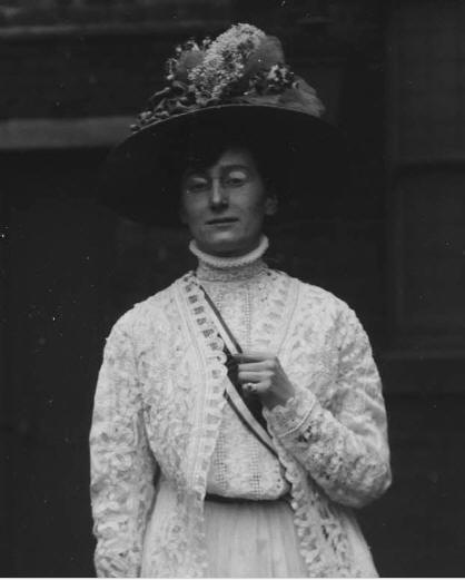 Marie Lawson, a leading member of the Women's Freedom League at the Green, Gold and White Fair, c.1909