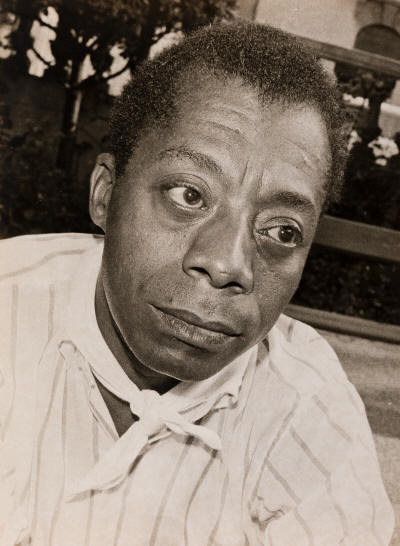JOHN PAIGNTON (JOHN S. BARRINGTON, 1920-1991) A group of 5 photographs of James Baldwin, author and advocate for the Civil Rights Movem