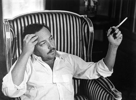 Tennesse Williams, lying in an armchair and smoking, Paris, 1959 © Gisèle Freund
