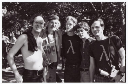 Prescott Townsend with four other young men at a Pride Parade