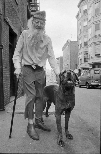 A bearded Prescott Townsend with a dog. 