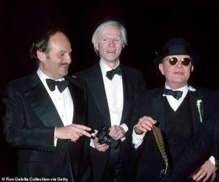 Among the men who caught Warhol's eye was author Truman Capote who he became obsessed with and began stalking. Pictured: American film producer Lester Persky with Warhol and Capote in 1978