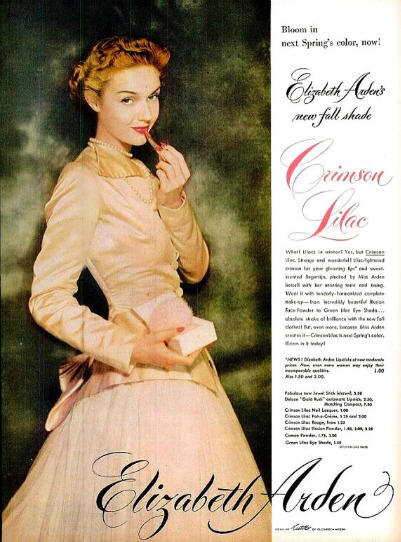 Elizabeth Arden Cosmetic Ad from 1948 for Crimson Lilac Lipstick.. Model is wearing  Antonio Castillo designed gown