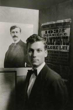 Izis Bidermanas | Alain Feydeau posant au côté du portrait de son  grand-père Georges Feydeau (1946) | MutualArt